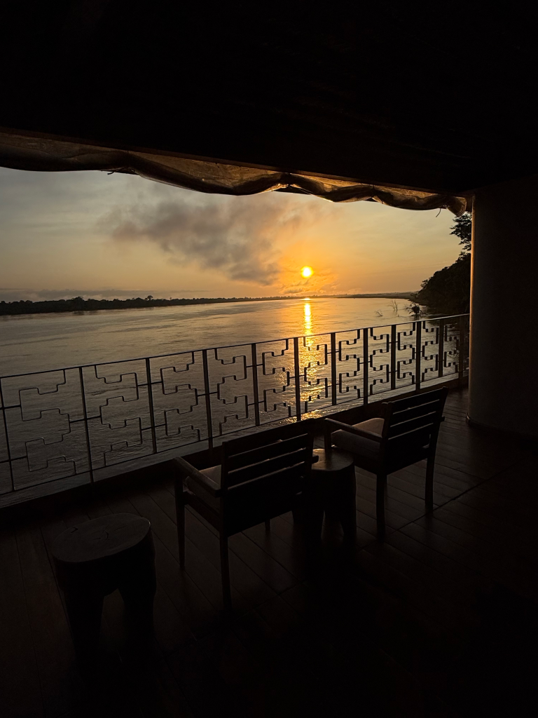 Sunset view over the Peruvian Amazon River from the deck of Delfín Amazon Cruises