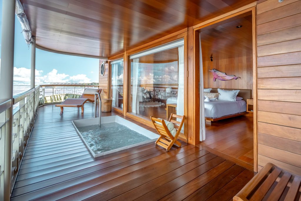 suite with private terrace and plunge pool onboard Delfín Amazon Cruises overlooking the Amazon River