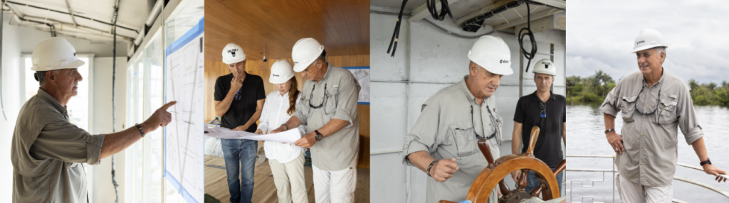 Founder of Delfín Amazon Cruises reviewing plans and navigating onboard, showcasing leadership and vision behind the experience