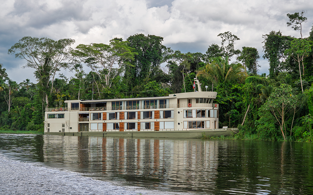 Delfín Amazon Cruises luxury river cruise navigating the Amazon rainforest in Peru