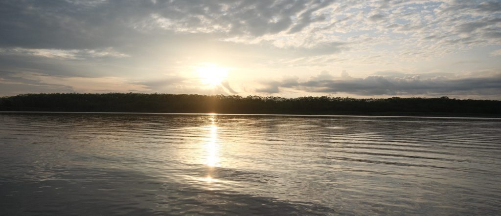 Sunlight reflected across the Amazon River in Peru